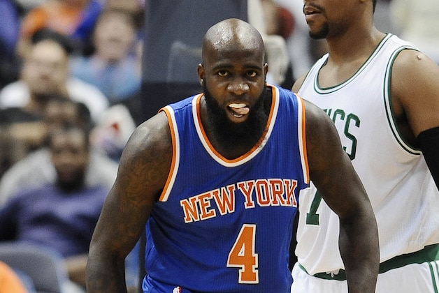 New York Knicks forward Quincy Acy (4) reacts during the first during the second half of a preseason NBA basketball game , Wednesday, Oct. 8, 2014, in Hartford, Conn. The Celtics won  (AP Photo/Jessica Hill)
