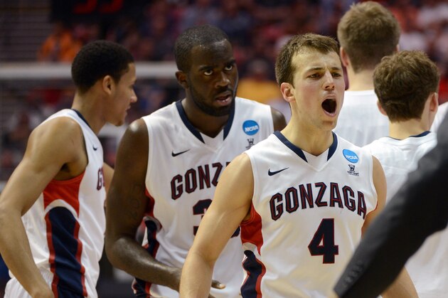 SAN DIEGO, CA - MARCH 21:  Kevin Pangos #4 of the Gonzaga Bulldogs reacts as he heads to the bench for a time out during their game against the Oklahoma State Cowboys in the second round of the 2014 NCAA Men's Basketball Tournament at Viejas Arena on March 21, 2014 in San Diego, California.  (Photo by Donald Miralle/Getty Images)