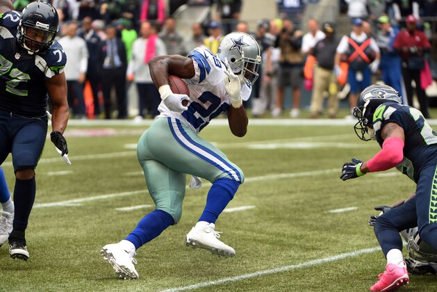 SEATTLE, WA - OCTBER 12: Running back DeMarco Murray #29 of the Dallas Cowboys runs for a touchdown during the fourth quarter of the game against the Seattle Seahawks at CenturyLink Field on October 12, 2014 in Seattle,Washington. (Photo by Steve Dykes/Getty Images)