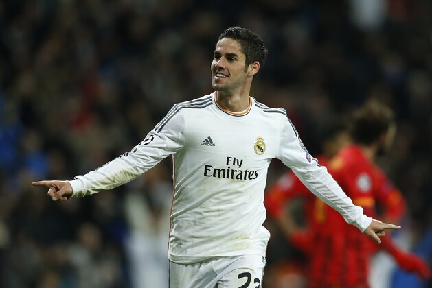 Real Madrid's Isco celebrates his goal during a Champions League Group B soccer match between Real Madrid and Galatasaray, at the Santiago Bernabeu stadium in Madrid, Wednesday, Nov. 27, 2013. (AP Photo/Andres Kudacki)