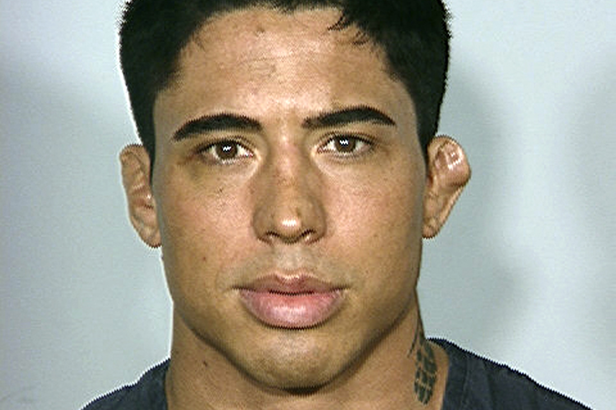 FILE - This undated file photo provided by the Las Vegas Metropolitan Police Department shows Jonathan Koppenhaver, a mixed martial arts fighter who is accused of brutally beating his porn star girlfriend in Las Vegas and then fleeing to California. He was arrested Friday Aug. 29, 2014 in California. The mixed martial arts fighter known as War Machine was extradited to Las Vegas Saturday, Aug. 30, 2014. (AP Photo/Las Vegas Metropolitan Police Department, File)