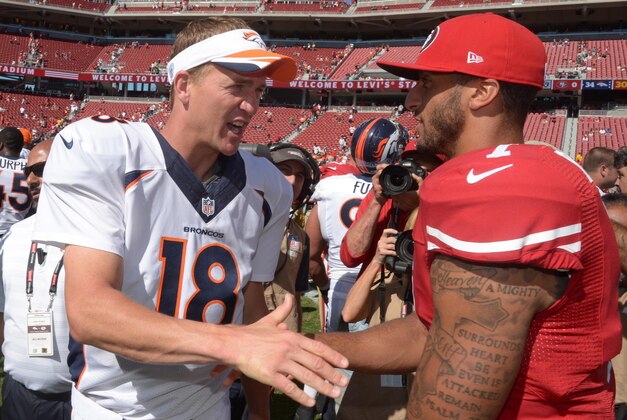 Aug 17, 2014; Santa Clara, CA, USA; Denver Broncos quarterback Peyton Manning (18) and San Francisco 49ers quarterback Colin Kaepernick (7) shake hands after the inaugural football game at Levi's Stadium. The Broncos defeated the 49ers 34-0. Mandatory Credit: Kirby Lee-USA TODAY Sports