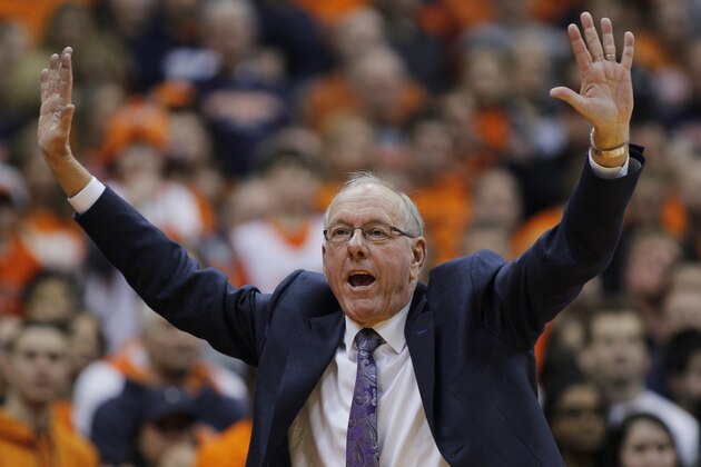 Syracuse coach Jim Boeheim calls out to his players in the second half of an NCAA college basketball game against North Carolina State in Syracuse, N.Y., Saturday, Feb. 15, 2014. Syracuse won 56-55. (AP Photo/Nick Lisi)