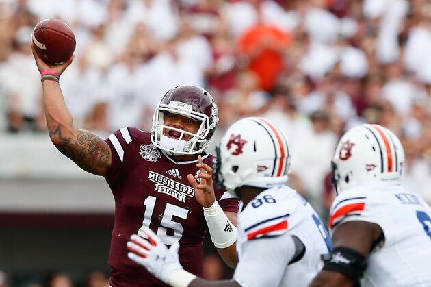 STARKVILLE, MS - OCTOBER 11:  Dak Prescott #15 of the Mississippi State Bulldogs passes against the Auburn Tigers at Davis Wade Stadium on October 11, 2014 in Starkville, Mississippi.  (Photo by Kevin C. Cox/Getty Images)