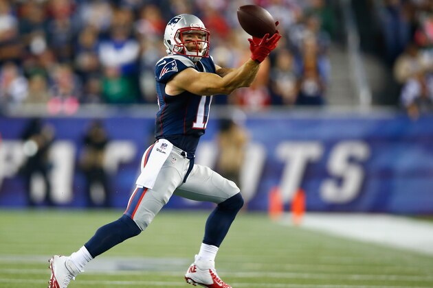 FOXBORO, MA - OCTOBER 16:  Julian Edelman #11 of the New England Patriots catches a pass during the second quarter against the New York Jets at Gillette Stadium on October 16, 2014 in Foxboro, Massachusetts.  (Photo by Jared Wickerham/Getty Images)