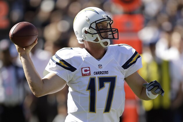 San Diego Chargers quarterback Philip Rivers (17) passes against the Oakland Raiders during the first quarter of an NFL football game in Oakland, Calif., Sunday, Oct. 12, 2014. (AP Photo/Ben Margot)