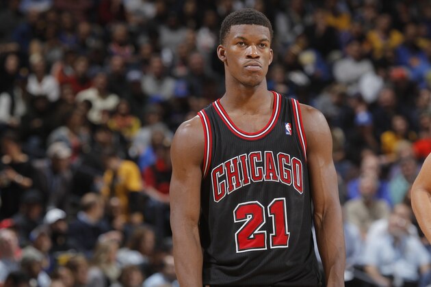 OAKLAND, CA - FEBRUARY 6: Jimmy Butler #21 of the Chicago Bulls in a game against the Golden State Warriors on February 6, 2014 at Oracle Arena in Oakland, California. NOTE TO USER: User expressly acknowledges and agrees that, by downloading and or using this photograph, user is consenting to the terms and conditions of Getty Images License Agreement. Mandatory Copyright Notice: Copyright 2014 NBAE (Photo by Rocky Widner/NBAE via Getty Images)