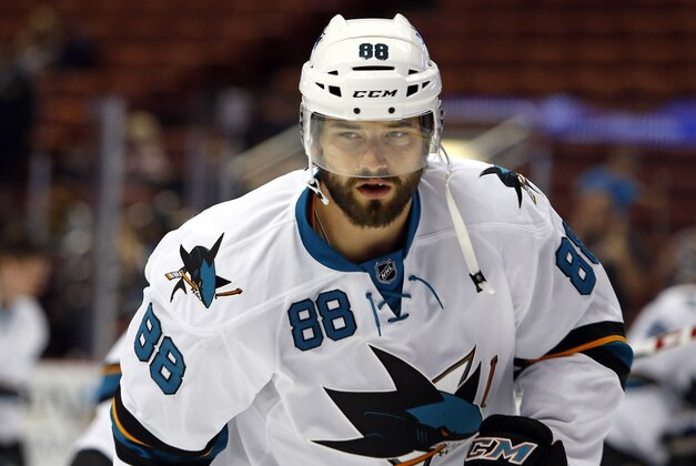 San Jose Sharks defenseman Brent Burns in a preseason NHL hockey game against the Anaheim Ducks in Anaheim, Calif., on Saturday, Oct. 4, 2014. (AP Photo/Christine Cotter)