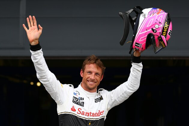 NORTHAMPTON, ENGLAND - JULY 05:  Jenson Button of Great Britain and McLaren celebrates in Parc Ferme after claiming third place on the grid during qualifying ahead of the British Formula One Grand Prix at Silverstone Circuit on July 5, 2014 in Northampton, United Kingdom.  (Photo by Dan Istitene/Getty Images)