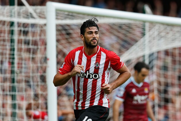 LONDON, ENGLAND - AUGUST 30:  Graziano Pelle of Southampton celebrates scoring his team's third goal during the Barclays Premier League match between West Ham United and Southampton at Boleyn Ground on August 30, 2014 in London, England.  (Photo by Steve Bardens/Getty Images)