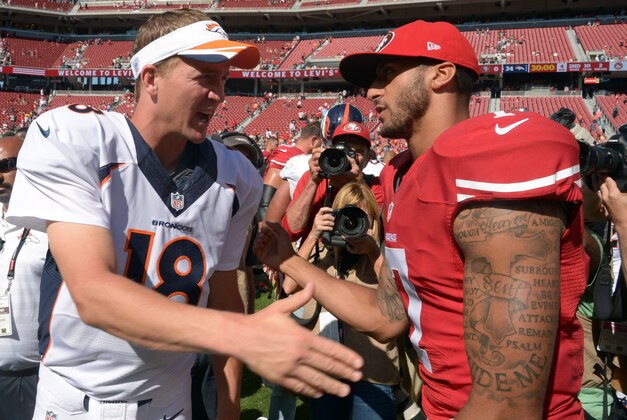 Aug 17, 2014; Santa Clara, CA, USA; Denver Broncos quarterback Peyton Manning (18) and San Francisco 49ers quarterback Colin Kaepernick (7) shake hands after the inaugural football game at Levi's Stadium. The Broncos defeated the 49ers 34-0. Mandatory Credit: Kirby Lee-USA TODAY Sports