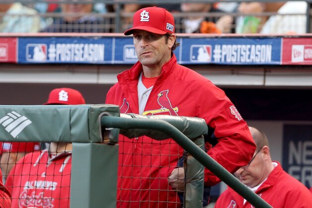 SAN FRANCISCO, CA - OCTOBER 16:  Manager Mike Matheny #22 of the St. Louis Cardinals looks on from the dugout while taking on the San Francisco Giants during Game Five of the National League Championship Series at AT&T Park on October 16, 2014 in San Francisco, California.  (Photo by Christian Petersen/Getty Images)