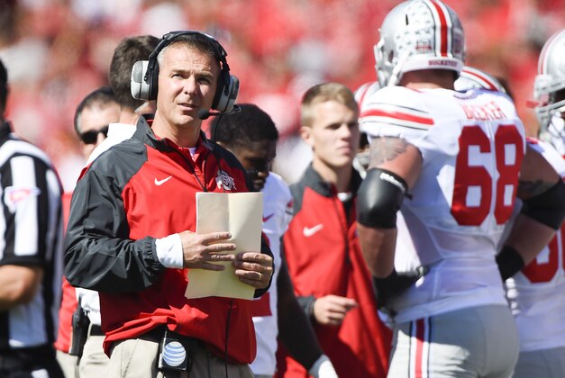 Oct 4, 2014; College Park, MD, USA; Ohio State Buckeyes head coach Urban Meyer stands on the sideline during a time out in the second quarter against the Maryland Terrapins at Byrd Stadium. Mandatory Credit: Tommy Gilligan-USA TODAY Sports