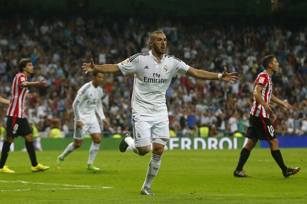 Real's Karim Benzema, celebrates his goal during a Spanish La Liga soccer match between Real Madrid and Athletic Bilbao at the Santiago Bernabeu stadium in Madrid, Spain, Sunday, Oct. 5, 2014. (AP Photo/Andres Kudacki)