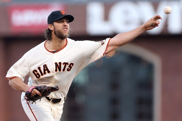 SAN FRANCISCO, CA - OCTOBER 16:  Madison Bumgarner #40 of the San Francisco Giants pitches in the second inning while taking on the St. Louis Cardinals during Game Five of the National League Championship Series at AT&T Park on October 16, 2014 in San Francisco, California.  (Photo by Christian Petersen/Getty Images)