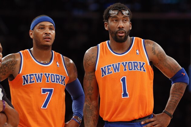 NEW YORK, NY - DECEMBER 08: Carmelo Anthony #7 and Amar'e Stoudemire #1 of the New York Knicks wait for play to resume during the second quarter against the Boston Celtics at Madison Square Garden on December 8, 2013 in New York City. NOTE TO USER: User expressly acknowledges and agrees that, by downloading and or using this Photograph, user is consenting to the terms and conditions of the Getty Images License Agreement.  (Photo by Bruce Bennett/Getty Images)
