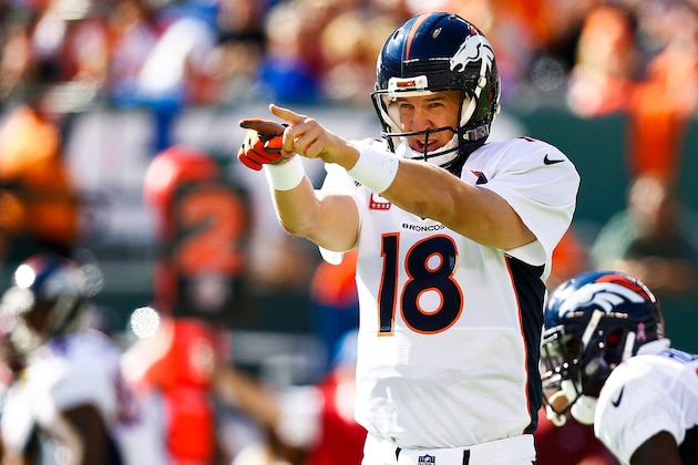 EAST RUTHERFORD, NJ - OCTOBER 12:  Peyton Manning #18 of the Denver Broncos yells to teammates in the second quarter during a game against the New York Jets at MetLife Stadium on October 12, 2014 in East Rutherford, New Jersey.  (Photo by Jeff Zelevansky/Getty Images)
