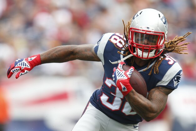 New England Patriots running back Brandon Bolden (38) runs with the ball after a reception during an NFL game against the Oakland Raiders at Gillette Stadium in Foxborough, Mass. on Sunday, Sept. 21, 2014 . (Chris Keane/AP Images for Panini)