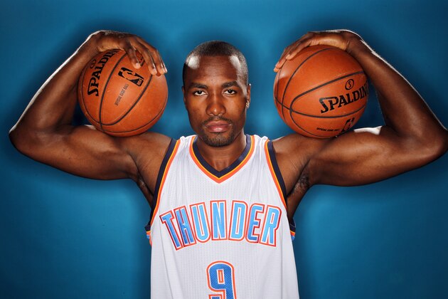 OKLAHOMA CITY, OK - SEPTEMBER 29: Serge Ibaka #9 of the Oklahoma City Thunder poses for a portrait during 2014 NBA Media Day on September 29, 2014 at the Thunder Events Center in Edmond, Oklahoma. NOTE TO USER: User expressly acknowledges and agrees that, by downloading and or using this Photograph, user is consenting to the terms and conditions of the Getty Images License Agreement. Mandatory Copyright Notice: Copyright 2014 NBAE (Photo by Layne Murdoch/NBAE via Getty Images)