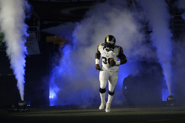 St. Louis Rams running back Zac Stacy is introduced before the start of an NFL football game against the St. Louis Rams Sunday, Sept. 21, 2014, in St. Louis. The Cowboys won 34-31. (AP Photo/Tom Gannam)