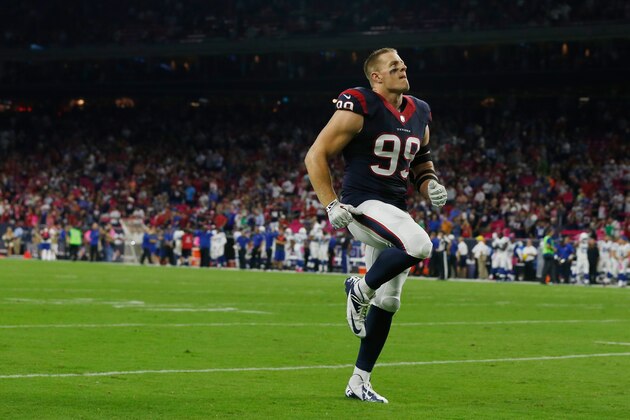 HOUSTON, TX - OCTOBER 09:  J.J. Watt #99 of the Houston Texans works out on the field prior to the start of their game against the Indianapolis Colts at NRG Stadium on October 9, 2014 in Houston, Texas.  (Photo by Scott Halleran/Getty Images)