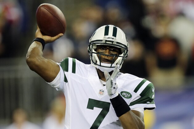 New York Jets quarterback Geno Smith passes against the New England Patriots in the first half of an NFL football game Thursday, Oct. 16, 2014, in Foxborough, Mass. (AP Photo/Charles Krupa)
