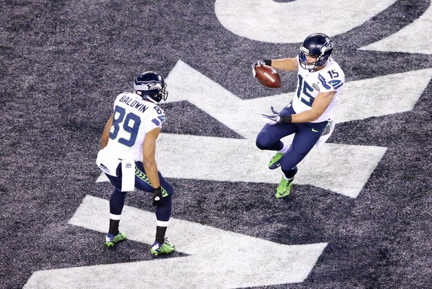 Feb 2, 2014; East Rutherford, NJ, USA; Seattle Seahawks wide receiver Jermaine Kearse (15) celebrates with wide receiver Doug Baldwin (89) after scoring a touchdown in the third quarter against the Denver Broncos in Super Bowl XLVIII at MetLife Stadium.  Mandatory Credit: Anthony Gruppuso-USA TODAY Sports