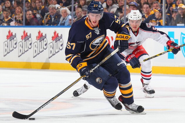 BUFFALO, NY - OCTOBER 09:  Tyler Myers #57 of the Buffalo Sabres skates against the Columbus Blue Jackets on October 9, 2014 at the First Niagara Center in Buffalo, New York.  (Photo by Bill Wippert/NHLI via Getty Images)