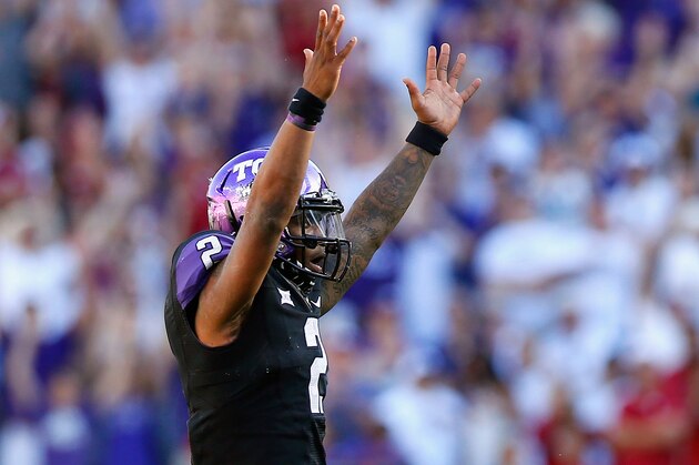 FORT WORTH, TX - OCTOBER 04:  Quarterback Trevone Boykin #2 of the TCU Horned Frogs celebrates after the Horned Frogs scored against the Oklahoma Sooners in the second half at Amon G. Carter Stadium on October 4, 2014 in Fort Worth, Texas.  (Photo by Tom Pennington/Getty Images)