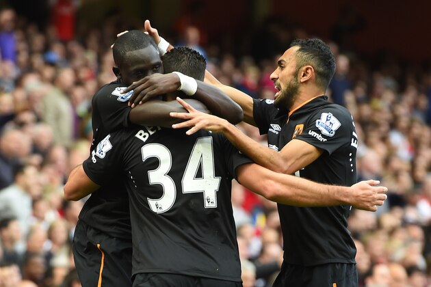 LONDON, ENGLAND - OCTOBER 18:  Mohamed Diame of Hull City celebrates with team-mate Hatem Ben Arfa and Ahmed Elmohamady after scoring their first goal during the Barclays Premier League match between Arsenal and Hull City at Emirates Stadium on October 18, 2014 in London, England.  (Photo by Mike Hewitt/Getty Images)