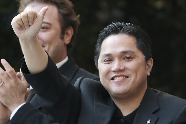 Inter Milan Indonesian President Erick Thohir waves prior to the start of the Serie A soccer match between Inter Milan and Sampdoria at the San Siro stadium in Milan, Italy, Sunday, Dec. 1, 2013. (AP Photo/Antonio Calanni)