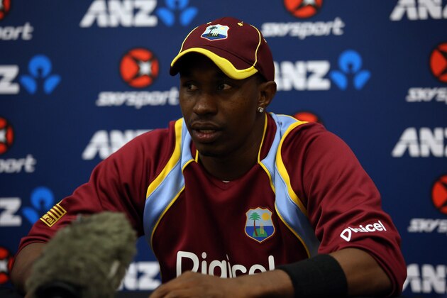 QUEENSTOWN, NEW ZEALAND - JANUARY 01:  Dwayne Bravo of the West Indies at the press conference after game three of the One Day International Series between New Zealand and the West Indies at Queenstown Events Centre on January 1, 2014 in Queenstown, New Zealand.  (Photo by Rob Jefferies/Getty Images)