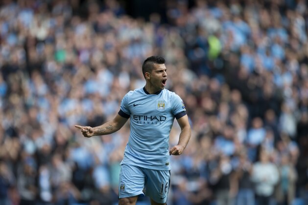 Manchester City's Sergio Aguero celebrates after scoring his third goal against Tottenham during the English Premier soccer match between Manchester City and Tottenham Hotspur at the Etihad Stadium, Manchester, England, Saturday Oct. 18, 2014. (AP Photo/Jon Super)
