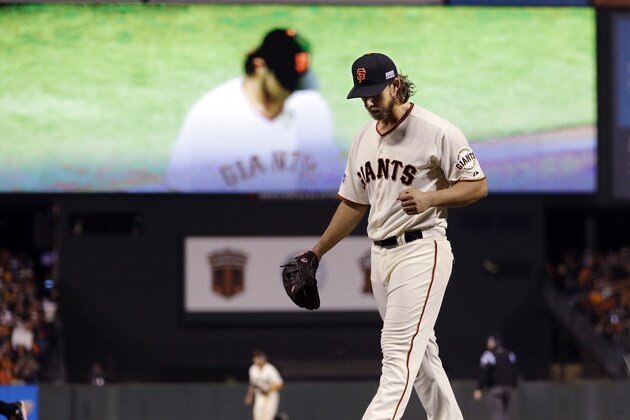 San Francisco Giants starting pitcher Madison Bumgarner walks off the field during the eighth inning of Game 5 of the National League baseball championship series against the St. Louis Cardinals Thursday, Oct. 16, 2014, in San Francisco. (AP Photo/Jeff Roberson)