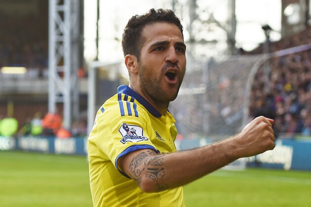 Chelsea’s Cesc Fabregas celebrates scoring his team's second goal during their English Premier League soccer match against Crystal Palace at Selhurst Park, London, Saturday, Oct. 18, 2014. (AP Photo/Tim Ireland)