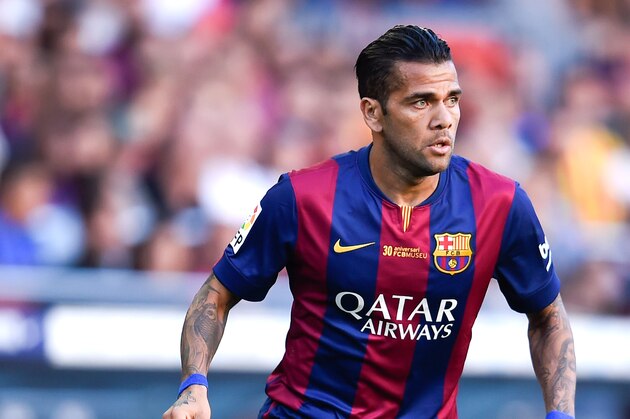 BARCELONA, SPAIN - SEPTEMBER 27: Dani Alves of FC Barcelona runs with the ball during the La Liga match between FC Barcelona and Granada CF at Camp Nou on September 27, 2014 in Barcelona, Spain. (Photo by David Ramos/Getty Images) BARCELONA, SPAIN - SEPTEMBER 27: Dani Alves of FC Barcelona runs with the ball during the La Liga match between FC Barcelona and Granada CF at Camp Nou on September 27, 2014 in Barcelona, Spain. (Photo by David Ramos/Getty Images)