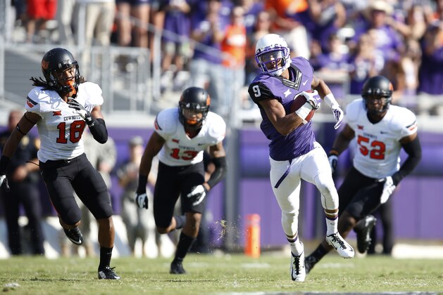 Oct 18, 2014; Fort Worth, TX, USA; TCU Horned Frogs receiver Josh Doctson (9) runs for a first quarter touchdown against the Oklahoma State Cowboys at Amon G. Carter Stadium. Mandatory Credit: Matthew Emmons-USA TODAY Sports