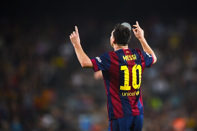 BARCELONA, SPAIN - OCTOBER 18:  Lionel Messi of FC Barcelona celebrates after scoring his team's third goal during the La Liga match between FC Barcelona and SD Eibar at Camp Nou on October 18, 2014 in Barcelona, Spain.  (Photo by David Ramos/Getty Images)