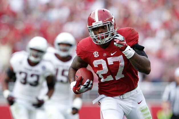 Oct 18, 2014; Tuscaloosa, AL, USA; Alabama Crimson Tide running back Derrick Henry (27) carries the ball for a touchdown against the Texas A&M Aggies at Bryant-Denny Stadium. Mandatory Credit: Marvin Gentry-USA TODAY Sports