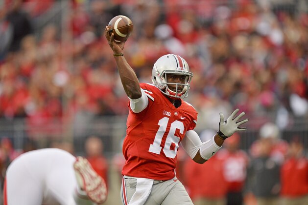 COLUMBUS, OH - OCTOBER 18:  Quarterback J.T. Barrett of the Ohio State Buckeyes completes a pass in the first quarter against the Rutgers Scarlet Knights on October 18, 2014 at Ohio Stadium in Columbus, Ohio.  (Photo by Jamie Sabau/Getty Images)