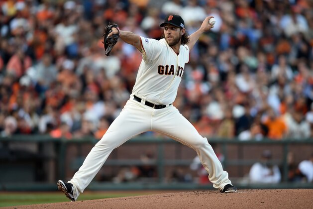 SAN FRANCISCO, CA - OCTOBER 16:  Madison Bumgarner #40 of the San Francisco Giants pitches in the first inning while taking on the St. Louis Cardinals during Game Five of the National League Championship Series at AT&T Park on October 16, 2014 in San Francisco, California.  (Photo by Thearon W. Henderson/Getty Images)