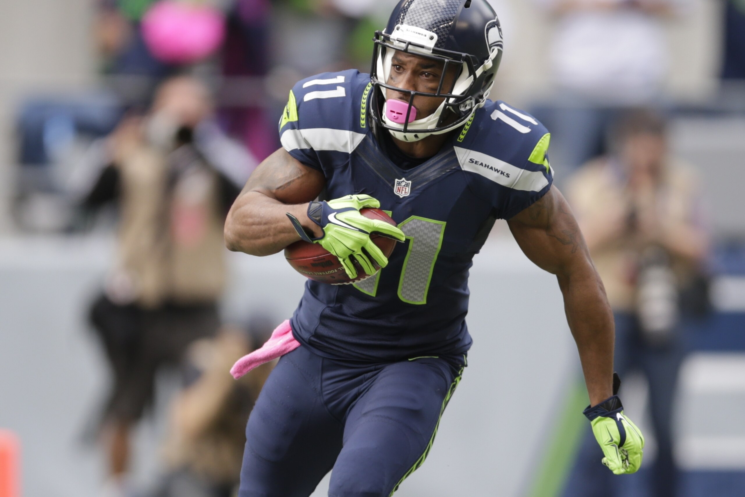 Seattle Seahawks' Percy Harvin returns a kickoff in the second half of an NFL football game against the Dallas Cowboys, Sunday, Oct. 12, 2014, in Seattle. (AP Photo/Scott Eklund)
