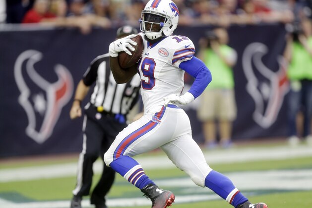 Buffalo Bills' Mike Williams (19) scores a touchdown against the Houston Texans during the fourth quarter of an NFL football game, Sunday, Sept. 28, 2014, in Houston. (AP Photo/Patric Schneider)
