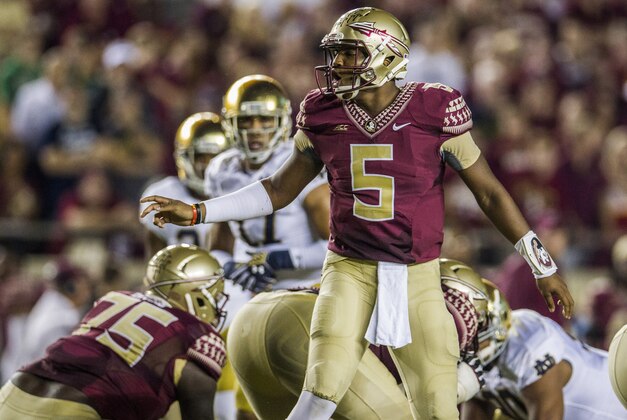 Florida State quarterback Jameis Winston changes the play at the line of scrimmage in the first half of an NCAA college football game against Notre Dame in Tallahassee, Fla., Saturday, Oct. 18, 2014. AP Photo/Mark Wallheiser)