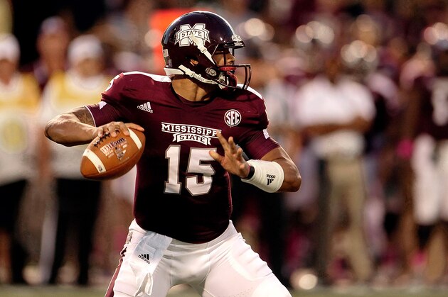 STARKVILLE, MS - OCTOBER 05:  Dak Prescott #15 of the Mississippi State Bulldogs drops back to pass against the LSU Tigers during a game at Davis Wade Stadium on October 5, 2013 in Starkville, Mississippi.  (Photo by Stacy Revere/Getty Images)