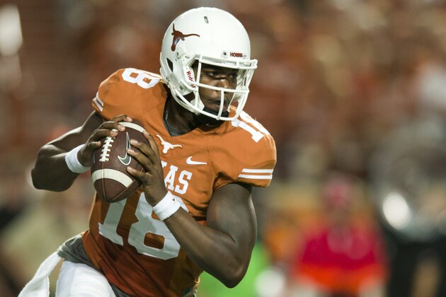 AUSTIN, TX - OCTOBER 18:  Tyrone Swoopes #18 of the Texas Longhorns scrambles against the Iowa State Cyclones on October 18, 2014 at Darrell K Royal-Texas Memorial Stadium in Austin, Texas.  (Photo by Cooper Neill/Getty Images)