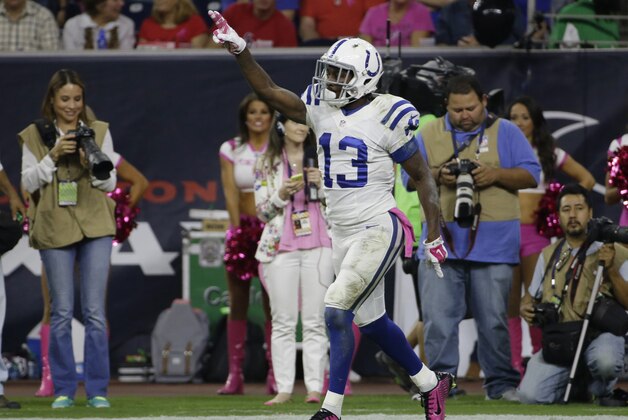Indianapolis Colts' T.Y. Hilton (13) celebrates during the first quarter of an NFL football game against the Houston Texans, Thursday, Oct. 9, 2014, in Houston. (AP Photo/David J. Phillip)