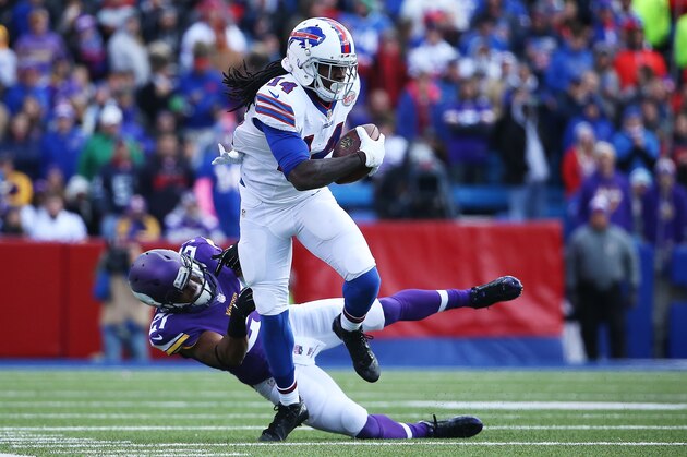ORCHARD PARK, NY - OCTOBER 19:   Sammy Watkins #14 of the Buffalo Bills makes a reception as  Josh Robinson #21 of the Minnesota Vikings defends during the first half at Ralph Wilson Stadium on October 19, 2014 in Orchard Park, New York.  (Photo by Tom Szczerbowski/Getty Images)