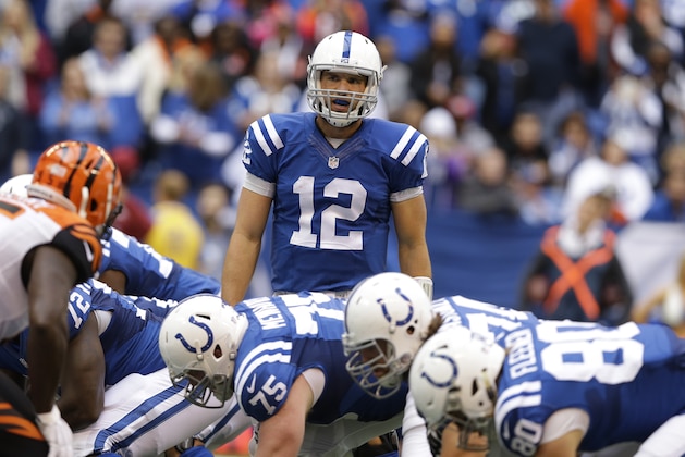 Indianapolis Colts quarterback Andrew Luck (12) calls a play during the first half of an NFL football game against the Cincinnati Bengals Sunday, Oct. 19, 2014, in Indianapolis. (AP Photo/Michael Conroy)