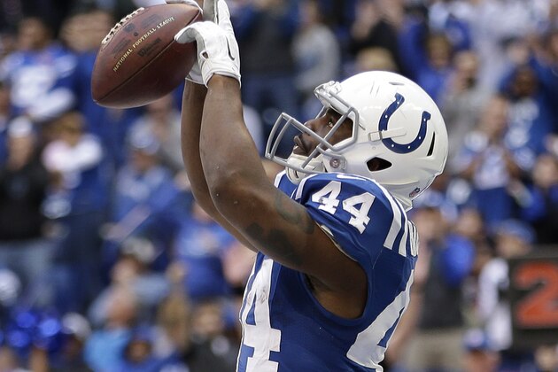 Indianapolis Colts running back Ahmad Bradshaw (44) celebrates following a 1-yard touchdown run during the first half of an NFL football game against the Cincinnati Bengals, Sunday, Oct. 19, 2014, in Indianapolis. (AP Photo/AJ Mast)